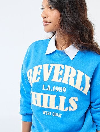 Sweater van joggingstof met opschrift