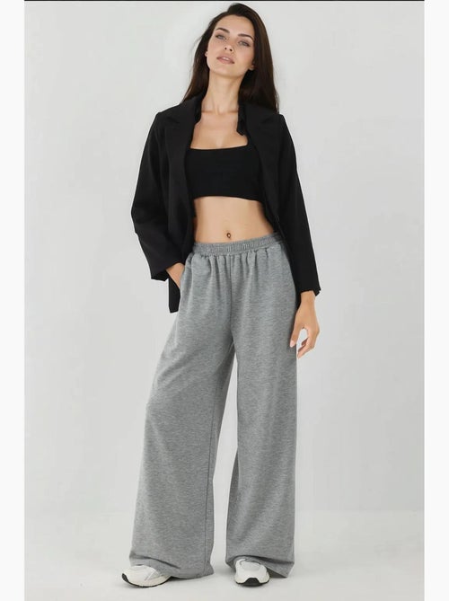 Sweatpants met wijde pijpen en elastische tailleband hiccup - Kiabi Sweatpants met wijde pijpen en elastische tailleband hiccup - Kiabi