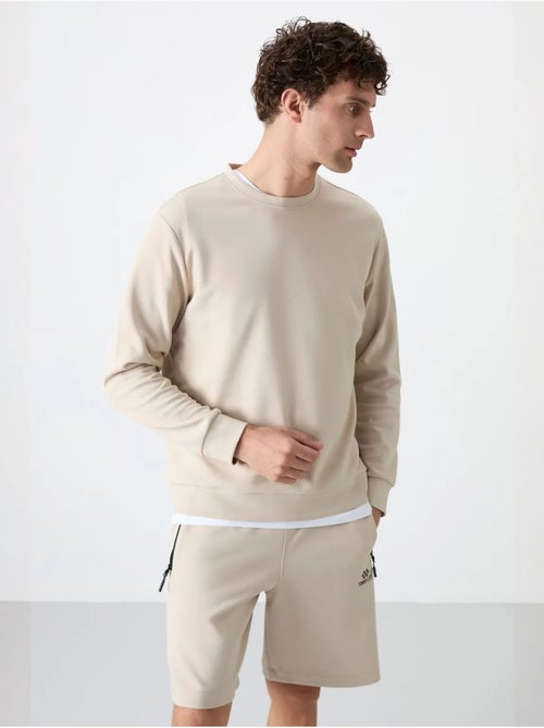 Sweatshirt homme uni à col rond tommy - Kiabi Sweatshirt homme uni à col rond tommy - Kiabi