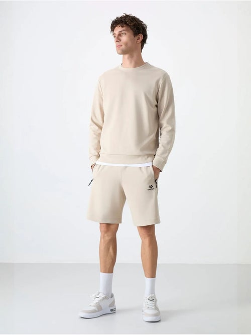 Sweatshirt homme uni à col rond tommy - Kiabi Sweatshirt homme uni à col rond tommy - Kiabi