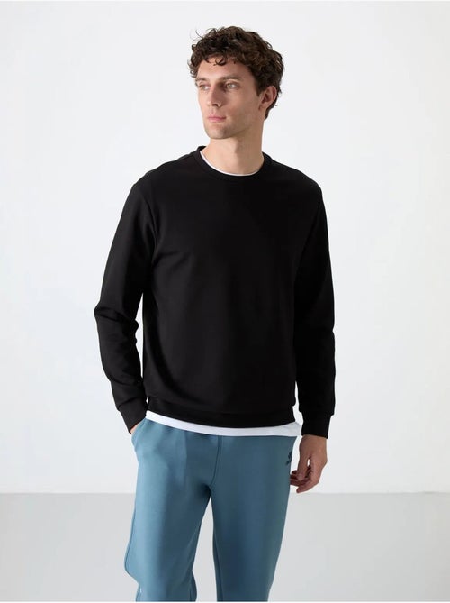 Sweatshirt homme uni à col rond tommy - Kiabi Sweatshirt homme uni à col rond tommy - Kiabi