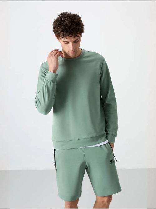 Sweatshirt homme uni à col rond tommy - Kiabi Sweatshirt homme uni à col rond tommy - Kiabi
