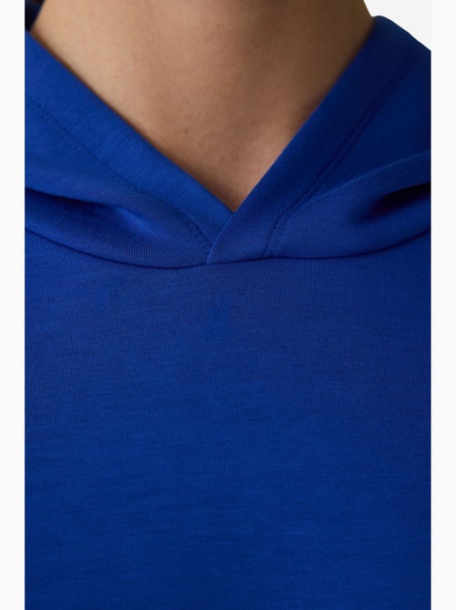 Sweatshirt met capuchon en sloganprint, zijdezachte touch penti - Kiabi Sweatshirt met capuchon en sloganprint, zijdezachte touch penti - Kiabi