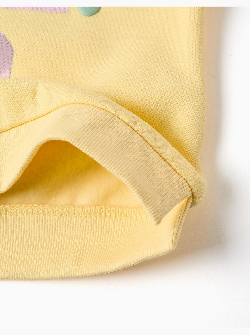 Sweatshirt met geborstelde stof en opgedrukte hartjes Geel - Kiabi