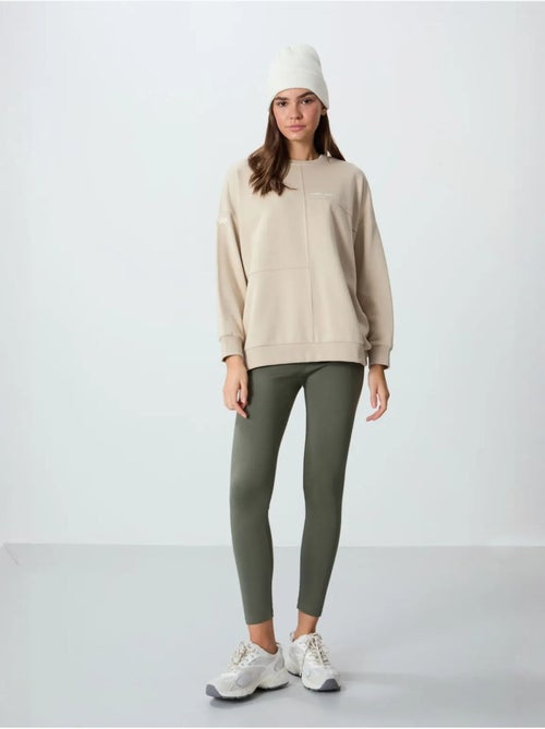 Sweatshirt oversize à col rond tommy - Kiabi Sweatshirt oversize à col rond tommy - Kiabi