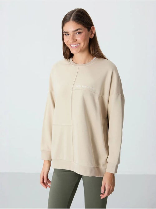 Sweatshirt oversize à col rond tommy - Kiabi Sweatshirt oversize à col rond tommy - Kiabi