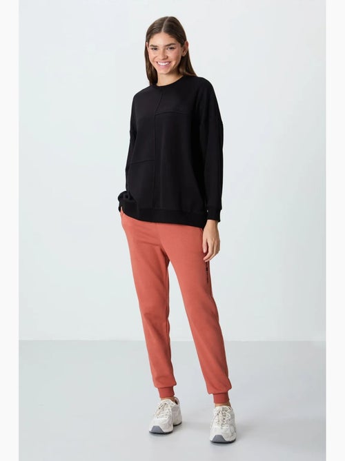 Sweatshirt oversize à col rond tommy - Kiabi Sweatshirt oversize à col rond tommy - Kiabi