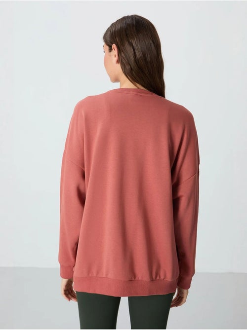 Sweatshirt oversize à col rond tommy - Kiabi Sweatshirt oversize à col rond tommy - Kiabi