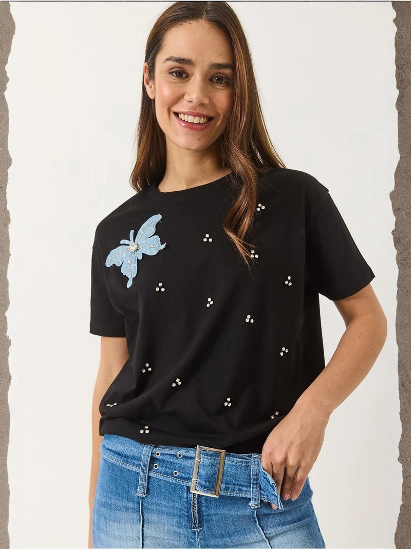 T-shirt à manches courtes avec accessoires papillon et ornements en pierre lucci Noir - Kiabi
