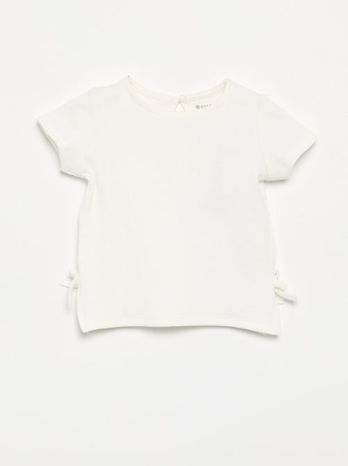 T-shirt à manches courtes avec nœuds - Kiabi T-shirt à manches courtes avec nœuds - Kiabi