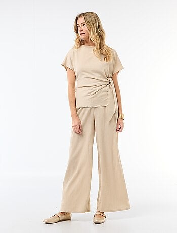 T-shirt à manches courtes drapé avec nœud en maille crêpée