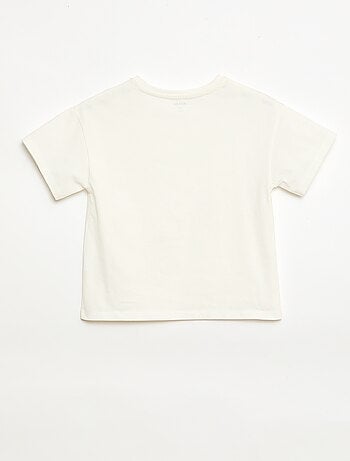 T-shirt avec fleurs en macramé