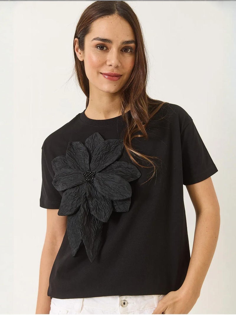 T-shirt en coton à manches courtes avec accessoire floral lucci Noir - Kiabi