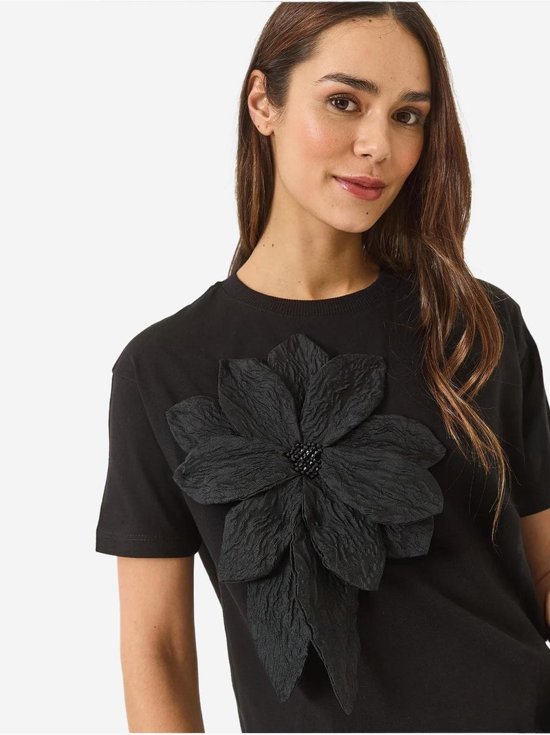 T-shirt en coton à manches courtes avec accessoire floral lucci Noir - Kiabi