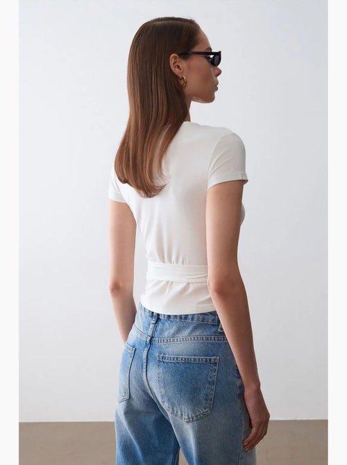 T-shirt kort overslag met strik lange mouwen dilvin - Kiabi T-shirt kort overslag met strik lange mouwen dilvin - Kiabi