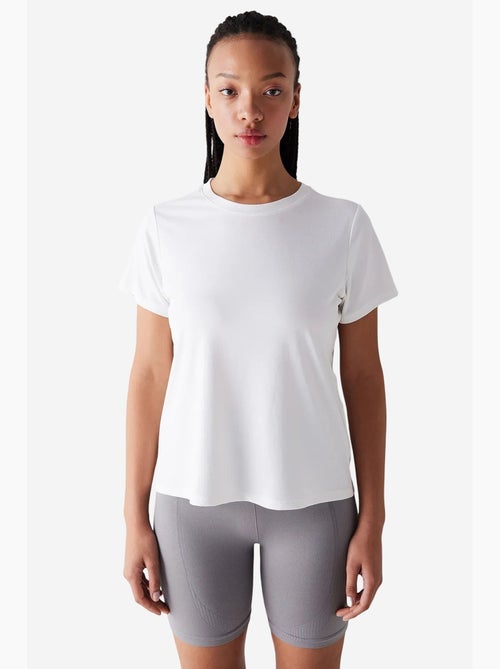 T-shirt loose en modal à col rond cassé penti - Kiabi T-shirt loose en modal à col rond cassé penti - Kiabi