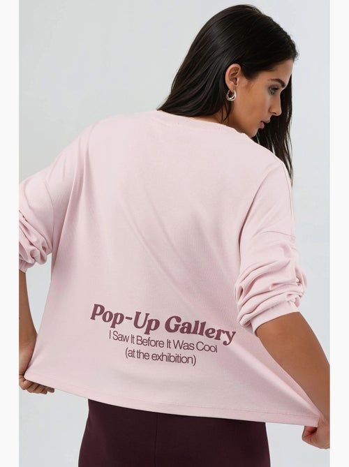 T-shirt los model ronde hals print achter lange mouwen busem - Kiabi T-shirt los model ronde hals print achter lange mouwen busem - Kiabi