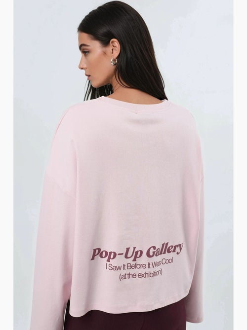 T-shirt los model ronde hals print achter lange mouwen busem - Kiabi T-shirt los model ronde hals print achter lange mouwen busem - Kiabi