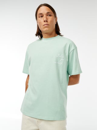 T-shirt met borduursel op de borst en print achter