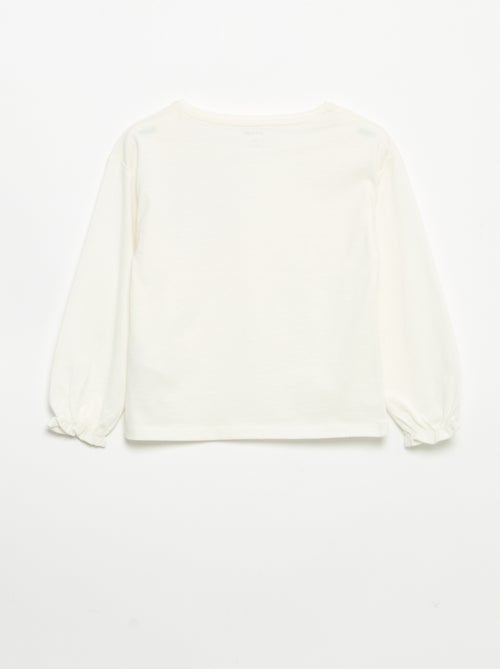 T-shirt met decoratieve strikjes en lange mouwen - Kiabi T-shirt met decoratieve strikjes en lange mouwen - Kiabi