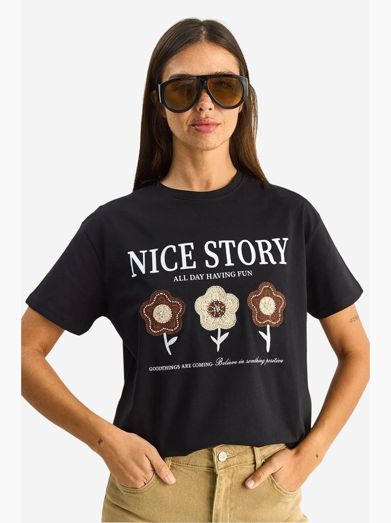 T-shirt met geborduurd detail en tekstprint in relaxed fit lucci Zwart - Kiabi
