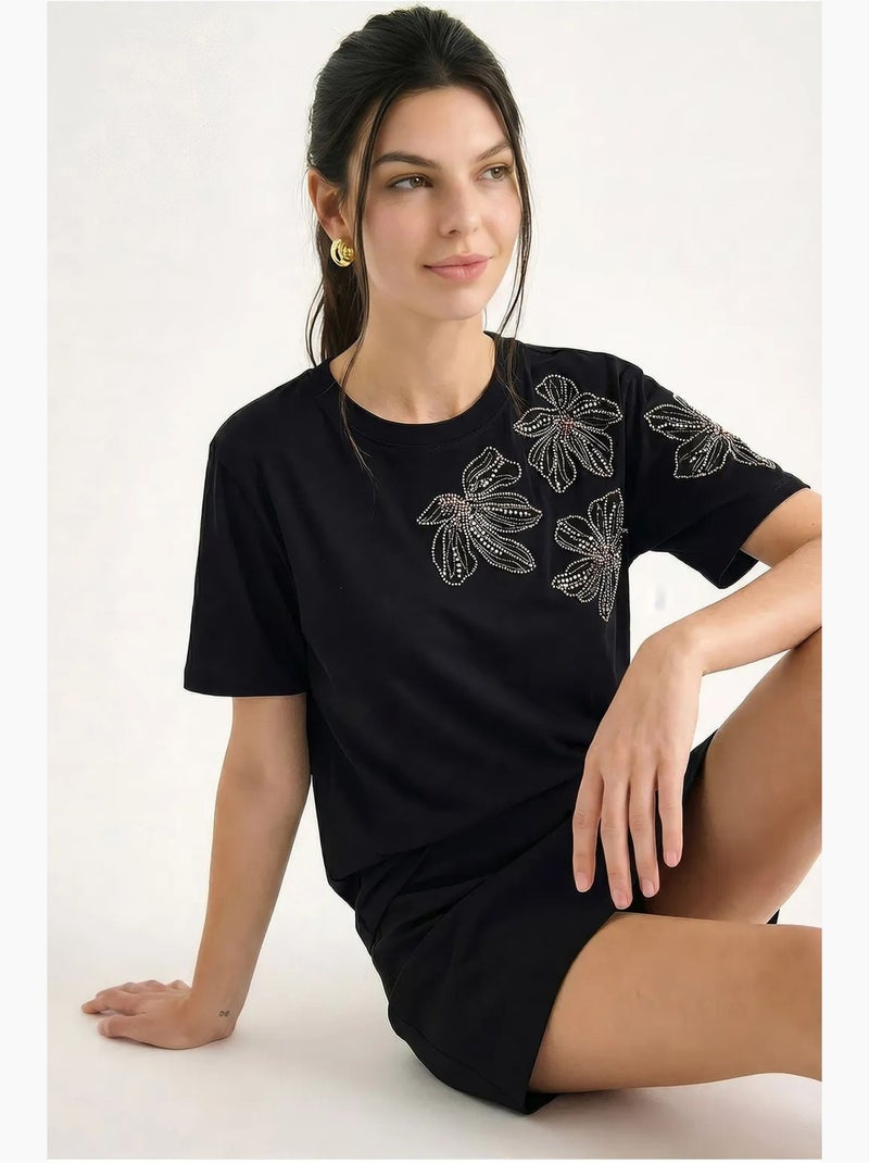 T-shirt met geborduurde bloemenprint en ronde hals lucci Zwart - Kiabi