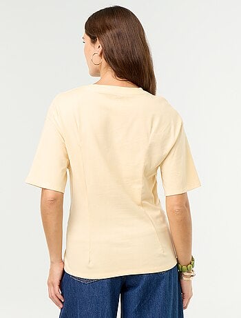 T-shirt met korte mouwen en goudkleurige schelp