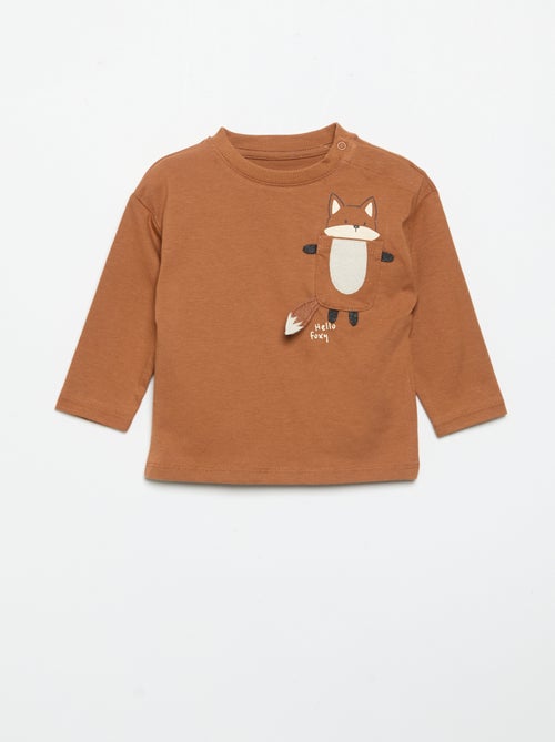 T-shirt met lange mouwen en geanimeerde zak - Kiabi T-shirt met lange mouwen en geanimeerde zak - Kiabi