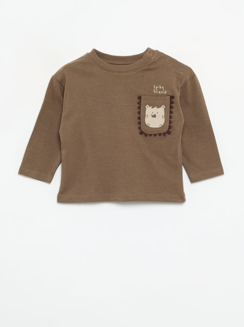 T-shirt met lange mouwen en geanimeerde zak - Kiabi T-shirt met lange mouwen en geanimeerde zak - Kiabi