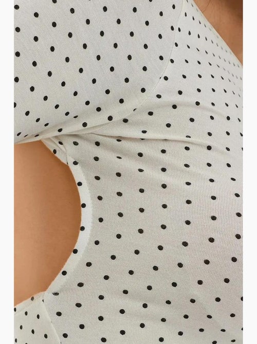 T-shirt met lange mouwen open rug stippen aansluitend hiccup - Kiabi T-shirt met lange mouwen open rug stippen aansluitend hiccup - Kiabi
