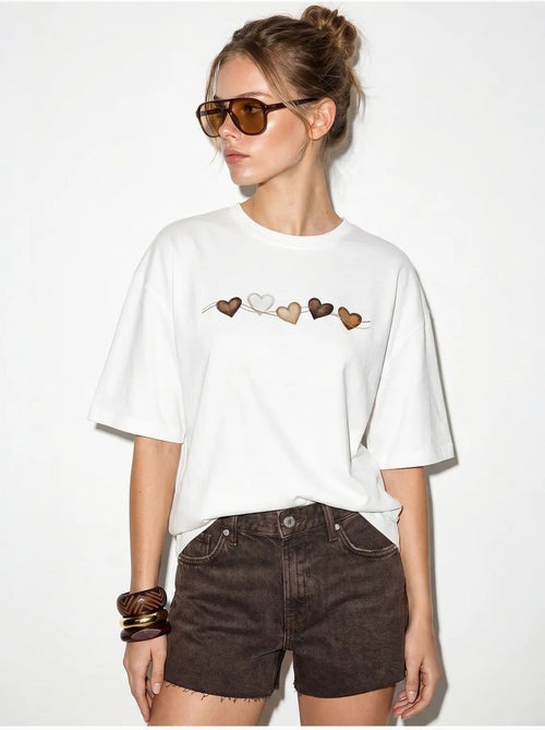 T-shirt oversize en coton avec imprimé cœur lucci - Kiabi T-shirt oversize en coton avec imprimé cœur lucci - Kiabi