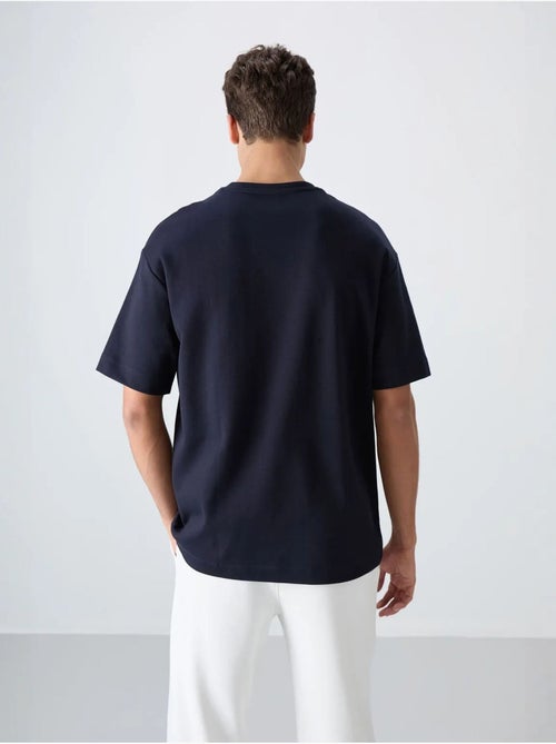 T-shirt oversize en mélange coton à col rond tommy - Kiabi T-shirt oversize en mélange coton à col rond tommy - Kiabi