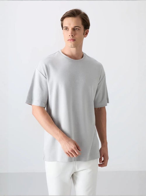 T-shirt oversize en mélange coton à col rond tommy - Kiabi T-shirt oversize en mélange coton à col rond tommy - Kiabi