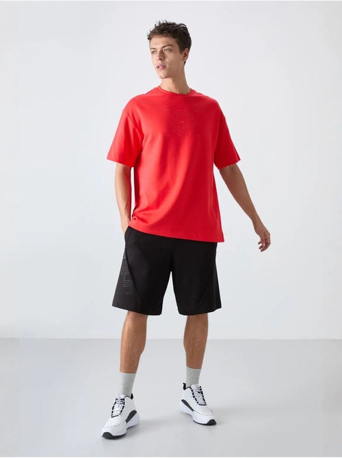T-shirt oversize en mélange coton à col rond tommy - Kiabi T-shirt oversize en mélange coton à col rond tommy - Kiabi
