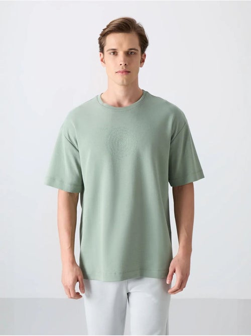 T-shirt oversize en mélange coton à col rond tommy - Kiabi T-shirt oversize en mélange coton à col rond tommy - Kiabi