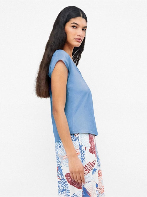 T-shirt sans manches en couleur bleue - Kiabi T-shirt sans manches en couleur bleue - Kiabi