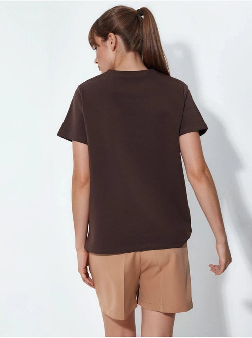 T-shirt uni à col rond busem - Kiabi T-shirt uni à col rond busem - Kiabi