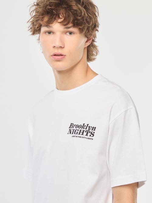 T-shirt uni imprimé recto/verso à manches longues - Kiabi