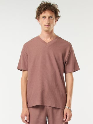 T-shirt van tricot met V-hals