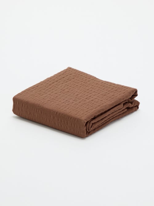 Taie d'oreiller unie - 63 x 63 cm en seersucker - Kiabi Taie d'oreiller unie - 63 x 63 cm en seersucker - Kiabi