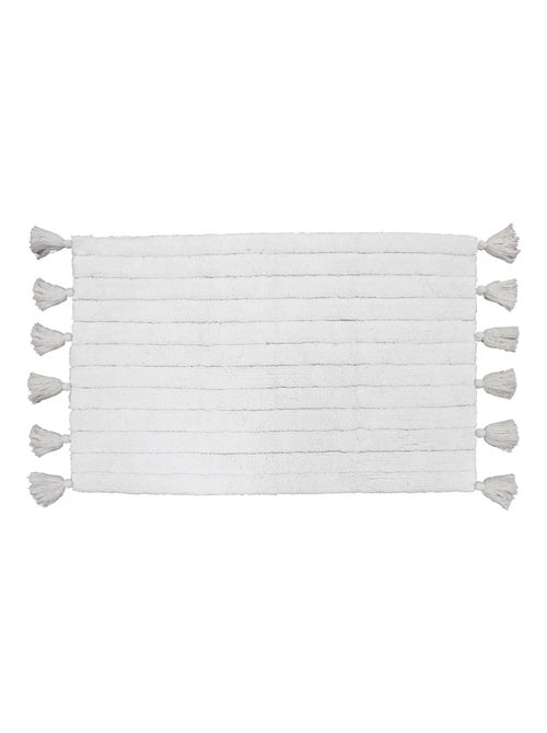 Tapis de bain uni et à pompons - Kiabi Tapis de bain uni et à pompons - Kiabi
