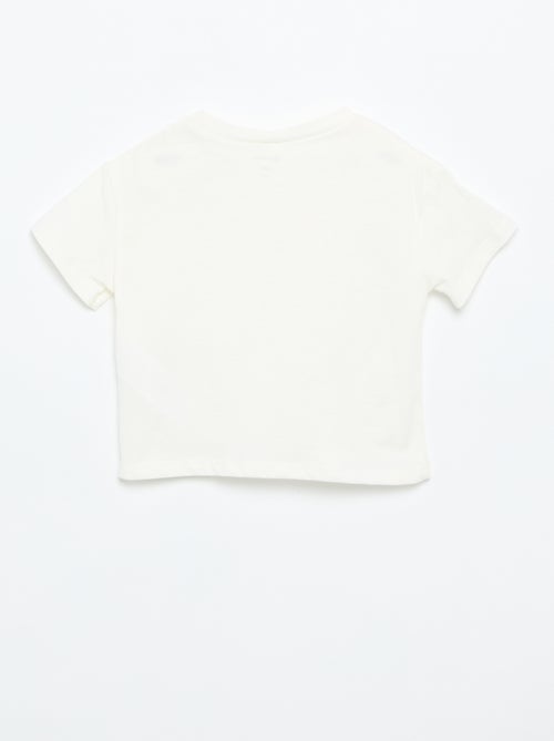 Tee-shirt à manches courtes avec fleurs sur l'épaule - Kiabi Tee-shirt à manches courtes avec fleurs sur l'épaule - Kiabi