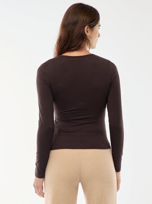 Tee-shirt à manches longues avec bijou doré devant effet twisté - Kiabi