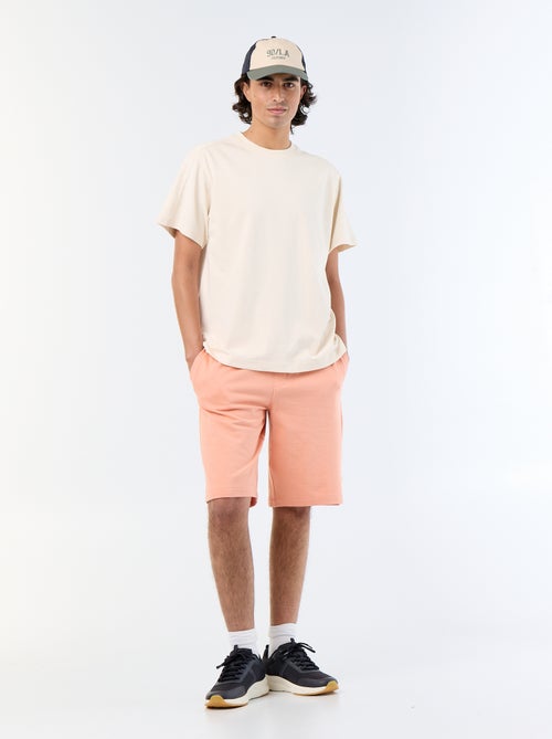 Tee-shirt uni coupe confort fit / oversize à manches courtes - Kiabi Tee-shirt uni coupe confort fit / oversize à manches courtes - Kiabi