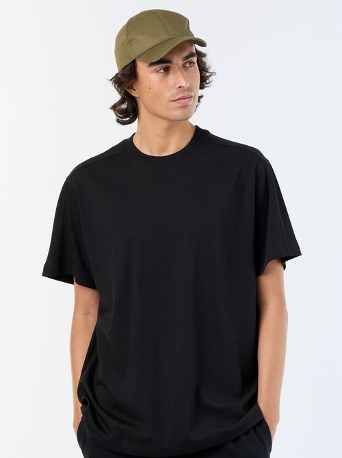 Tee-shirt uni coupe confort fit / oversize à manches courtes - Kiabi Tee-shirt uni coupe confort fit / oversize à manches courtes - Kiabi