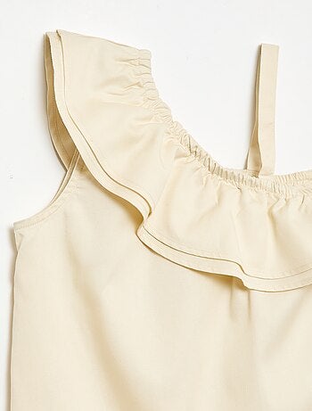 Top asymétrique à bretelles et col à volants