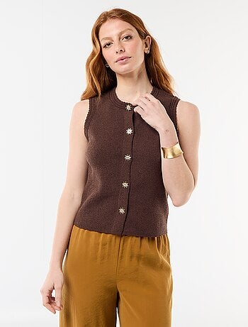 Top sans manches avec boutons dorés