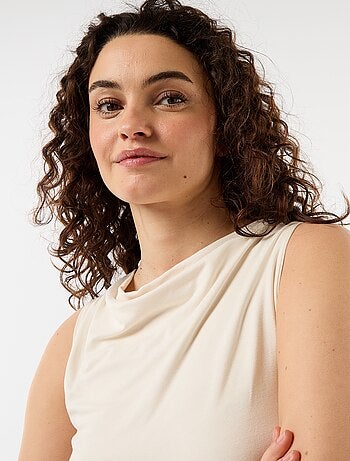 Top sans manches avec encolure drapée