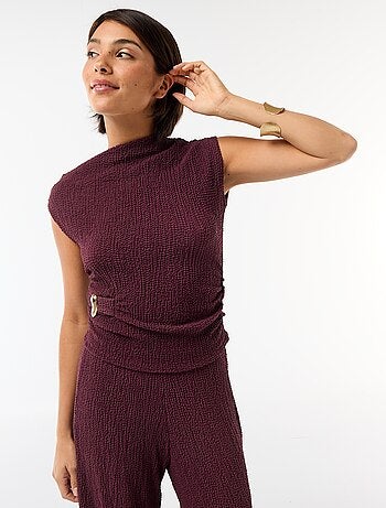 Top stretch uni asymétrique sans manches