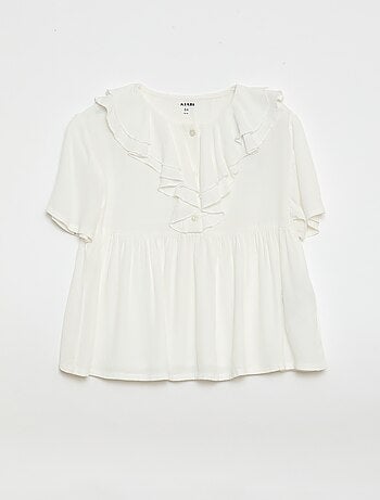 Top van licht tricot met motiefje